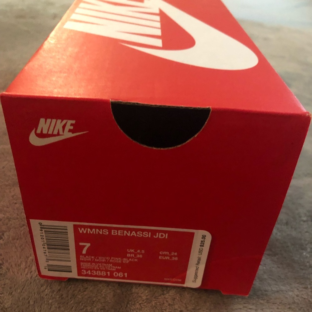 Brand new Nike Slides black and pink.